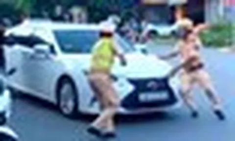 Nữ tài xế chốt cửa ô tô, tăng ga bỏ chạy khi bị CSGT dừng xe