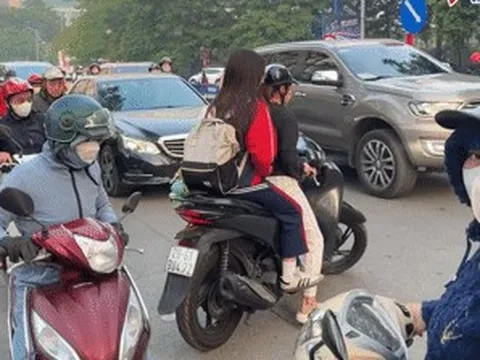 Phụ huynh chở con đi ngược chiều ở Hà Nội, nháo nhào quay đầu khi thấy CSGT