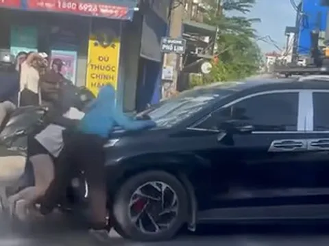 Công an xác minh clip ba người phụ nữ bám trên nắp capo ô tô đang chạy ở Hà Nội