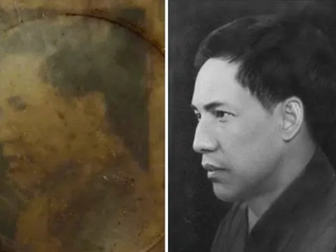 Phát hiện ảnh chân dung và ví khắc chữ 'Quân giải phóng' trong mộ liệt sĩ