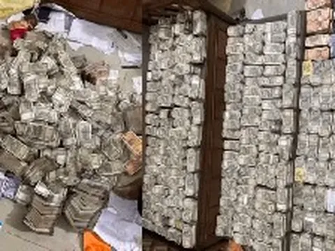 Tịch thu số vàng thỏi trị giá 450 triệu đồng, 13 tỷ đồng tiền mặt rải la liệt trong nhà của một công chức ngành mỏ đang nhận 9 triệu tiền hối lộ