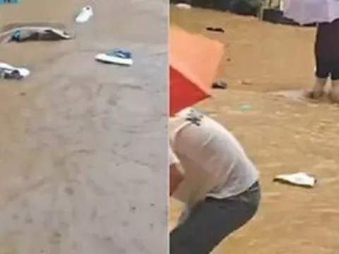 Hàng nghìn đôi giày trôi kín đường sau trận lũ ở Trung Quốc, người dân đổ xuống vớt, chủ xưởng thiệt hại hơn 100.000 NDT